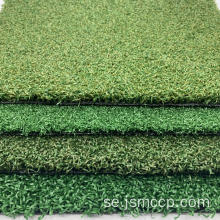 Artificiellt gräsgolf som sätter grönt